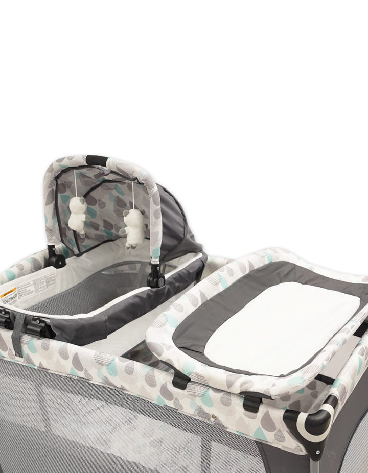 Bambies 4-in-1 Deluxe Travel Cribs with Bassinet, Changing Station and Rocking at Zubaidas